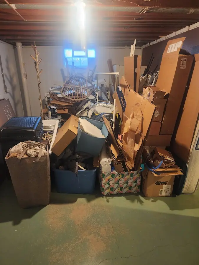 Roll-off dumpster container at job site for 2 Yard Dumpster Rental in North Smithfield